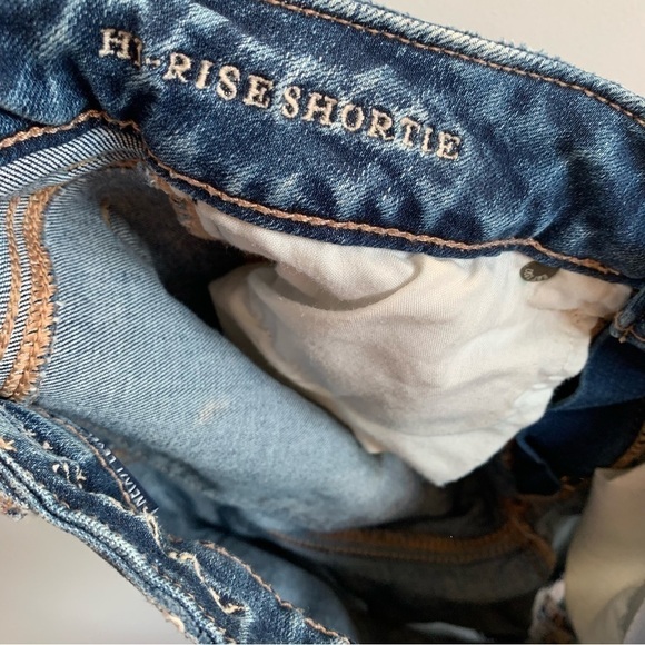 AEO Next Level Stretch Hi-rise Shortie Distressed Fray Denim Shorts - Picture 7 of 13